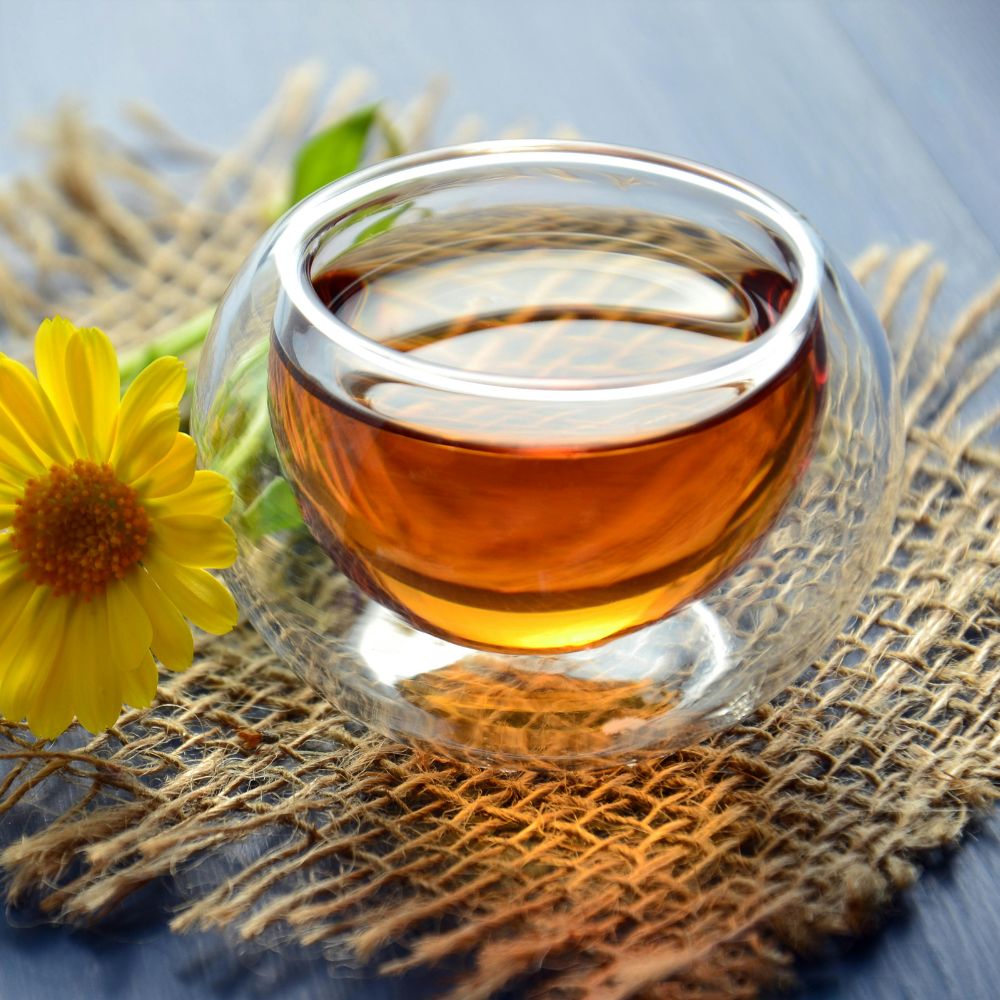ly trà xanh hỗ trợ giải nhiệt