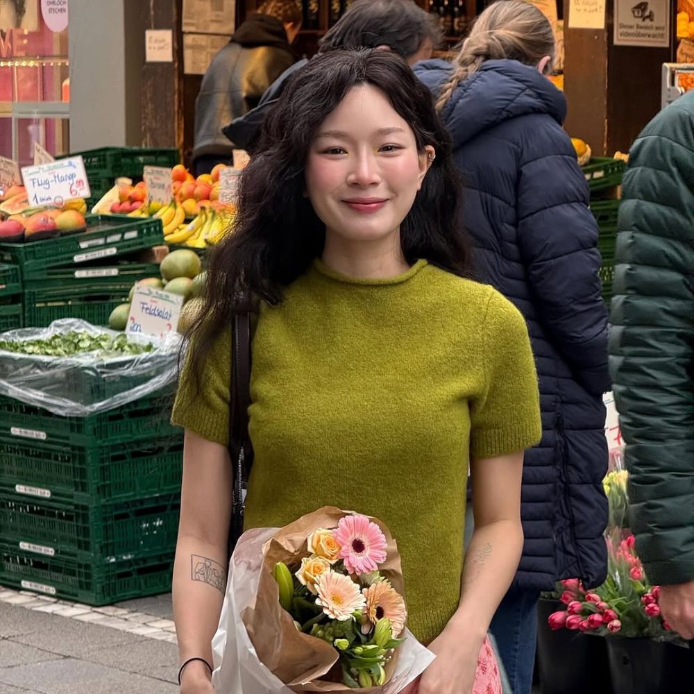 thạch trang với mái tóc xoăn sóng