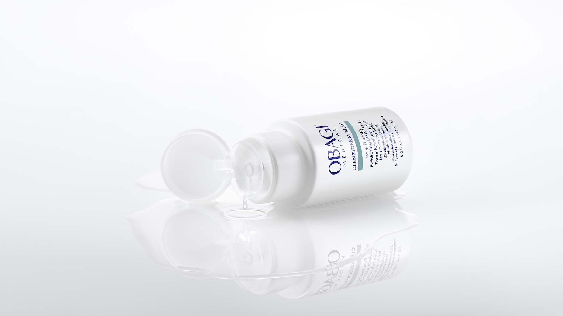 Chai OBAGI Clenziderm M.D. Pore Therapy Exfoliating BHA Toner với thiết kế mới, tinh tế và lớp toner trong suốt lan nhẹ, thể hiện kết cấu mát dịu.
