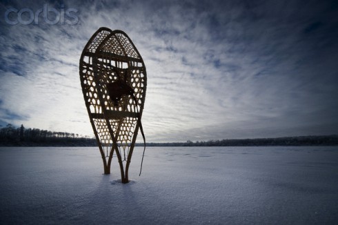 Snowshoes on a frozen lake