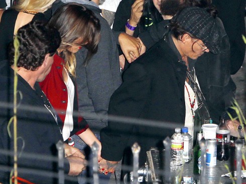 Depp đã công khai nắm tay Heard ra về sau khi xem buổi biểu diễn của The Rolling Stones.