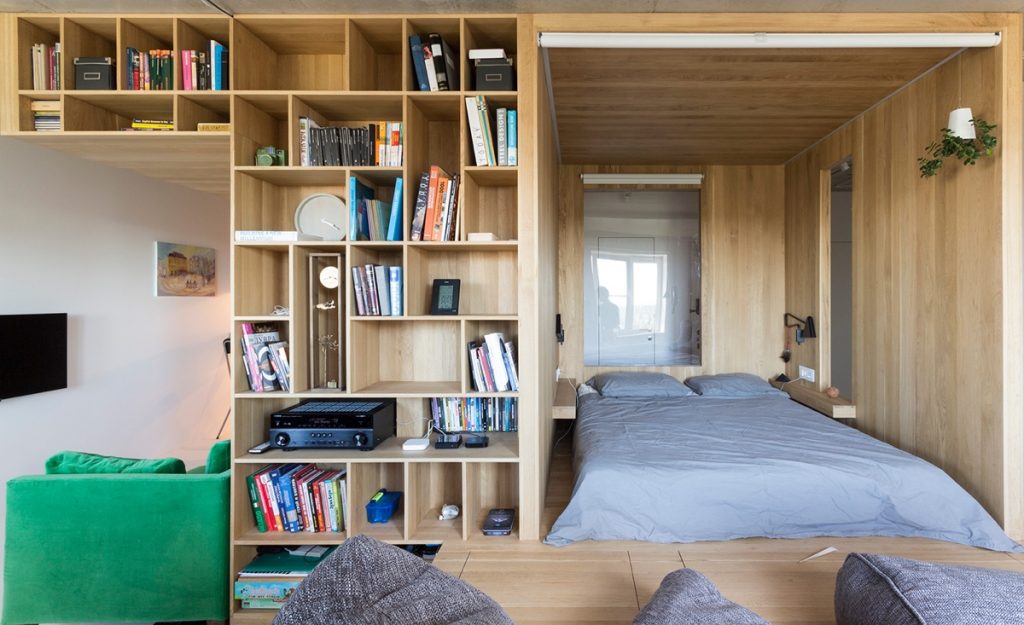 7.Front-on-bedroom-next-to-bookcase-home-under-50sqm-five-living-spaces-in-one