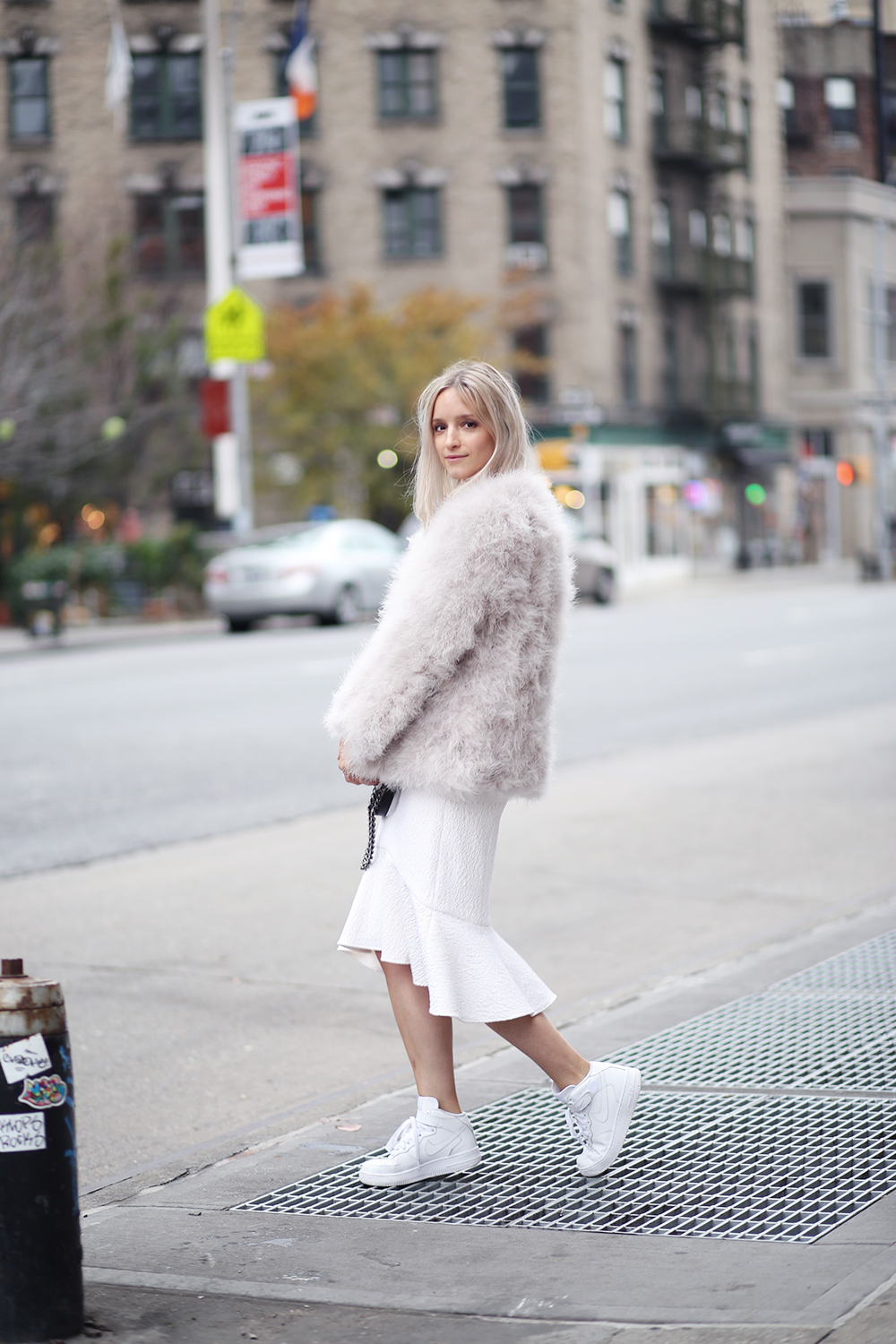 Nice dress with white tennis shoes and fur coat