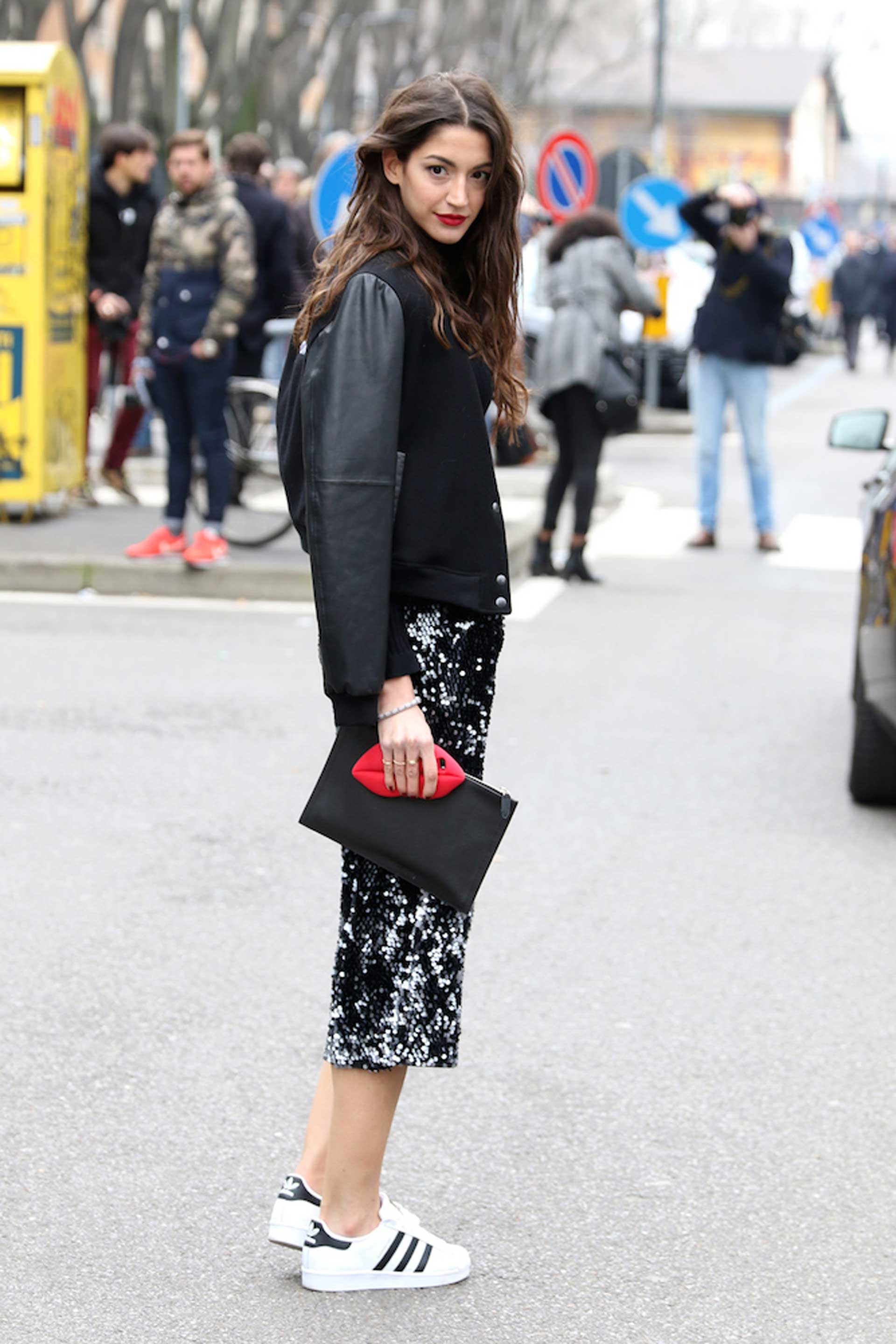 Dressed with white tennis shoes and sequin skirts