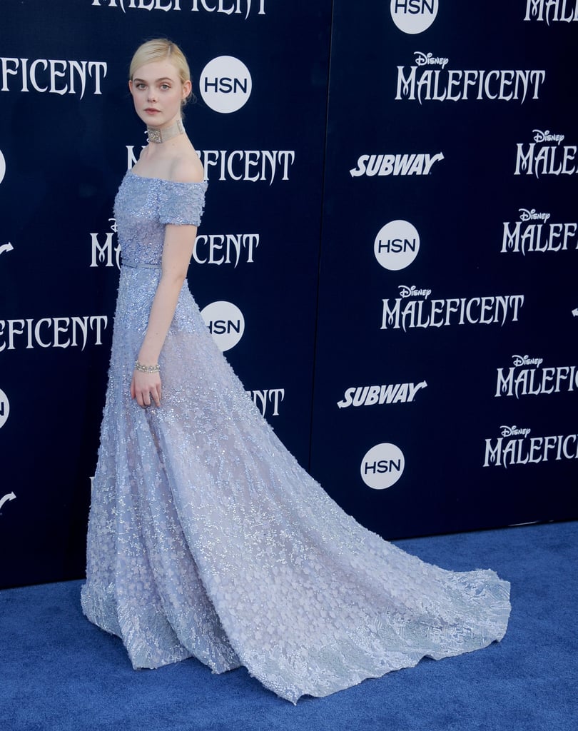 Elle Fanning diện đầm xanh tai buổi công chiếu maleficent năm 2014