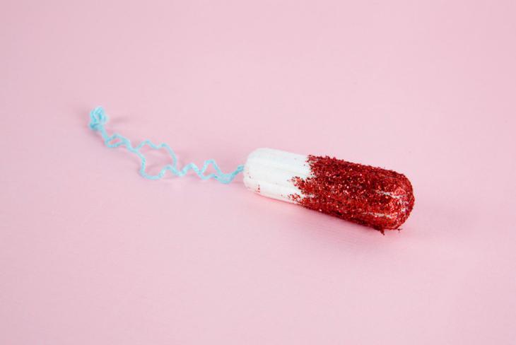 tampon bơi trong kỳ kinh