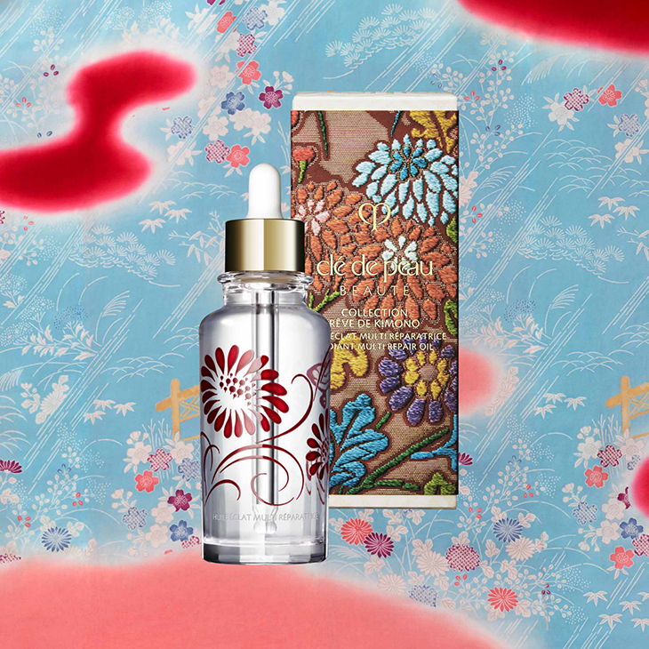  dầu dưỡng cle de peau beaute radiant multi repair oil giấc mơ kimono chai thuỷ tinh trong suốt vỏ thêu nền xanh biển