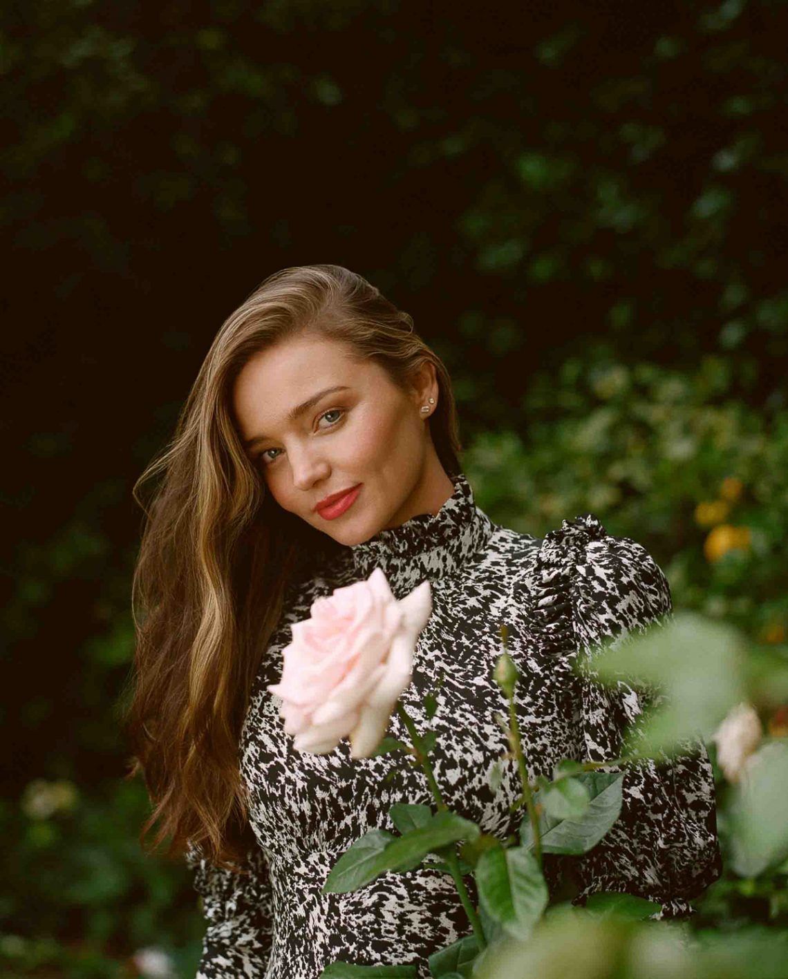 Những câu nói hay - Miranda Kerr mặc đầm hoa