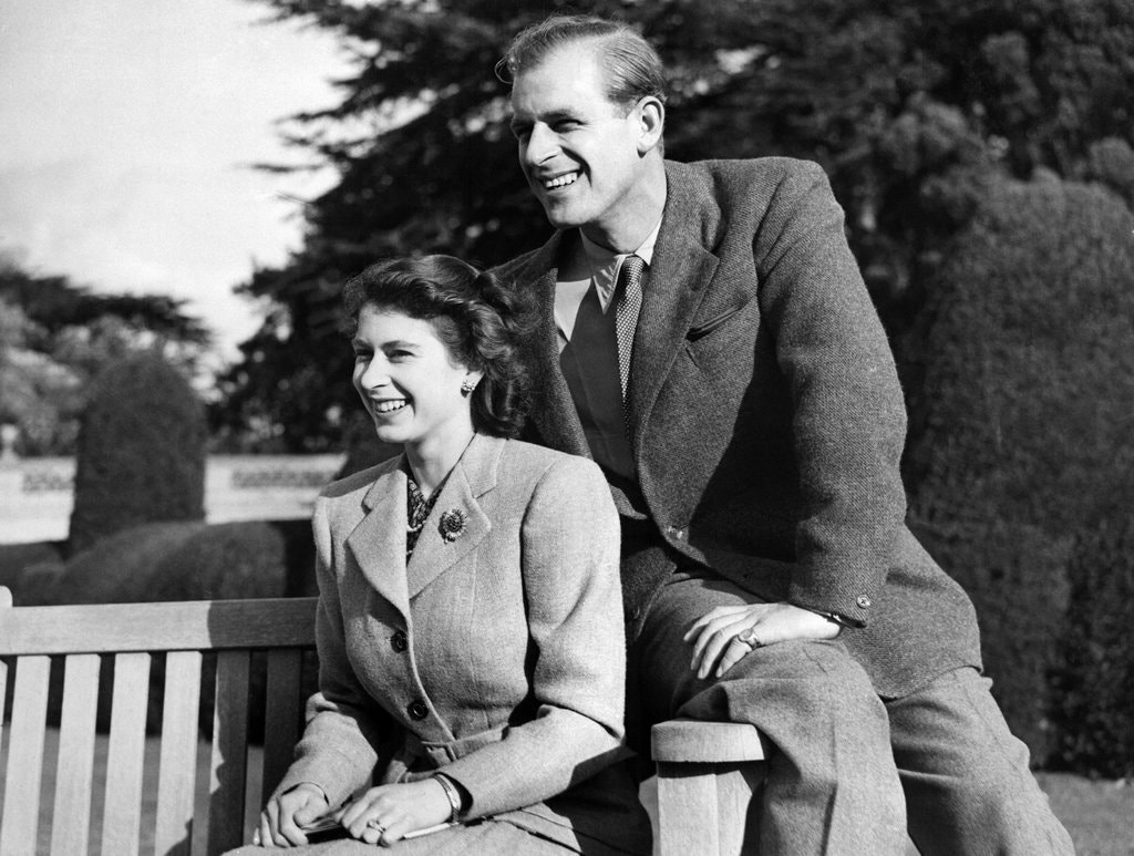 Prince Philip and queen Elizabeth in their honey moon wearing tweed set