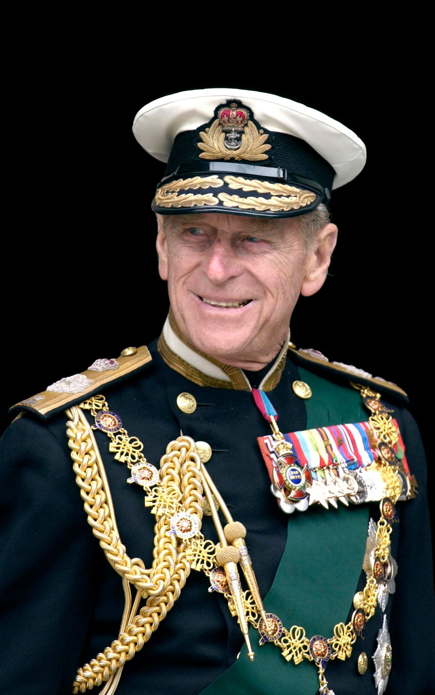 Prince Philip in military uniform with medals, braids and sashes