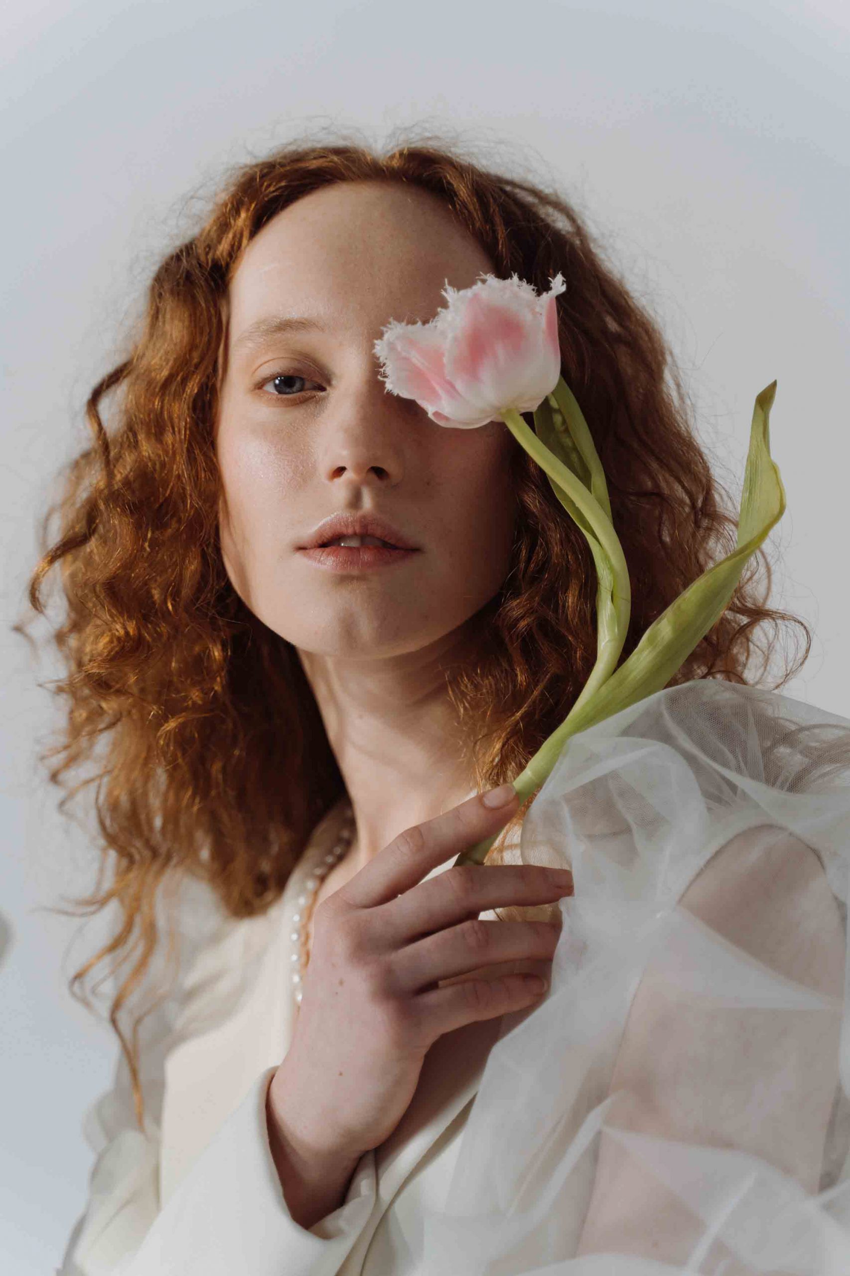 girl holding flowers and numbers