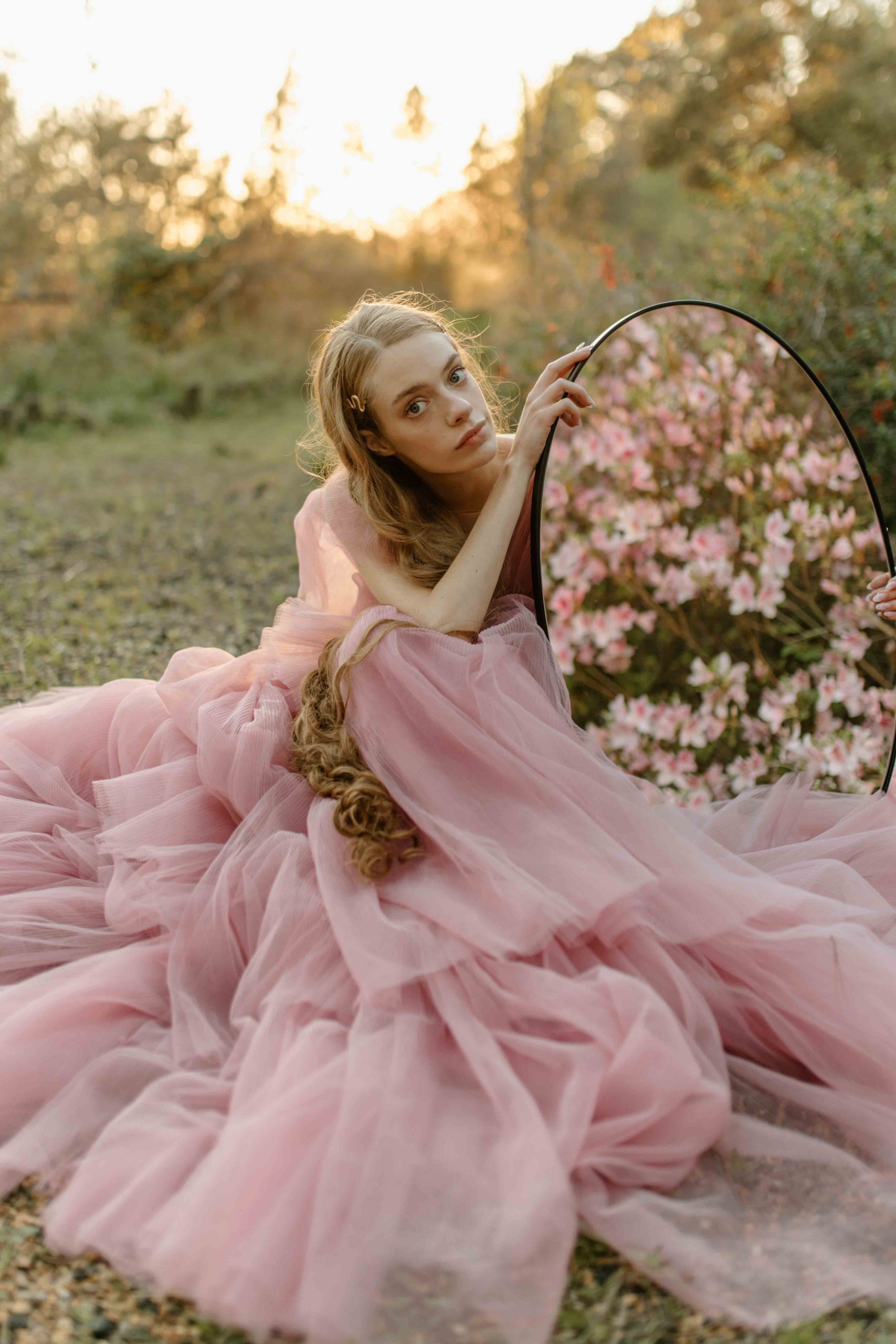 girl in pink dress with mirror and numbers