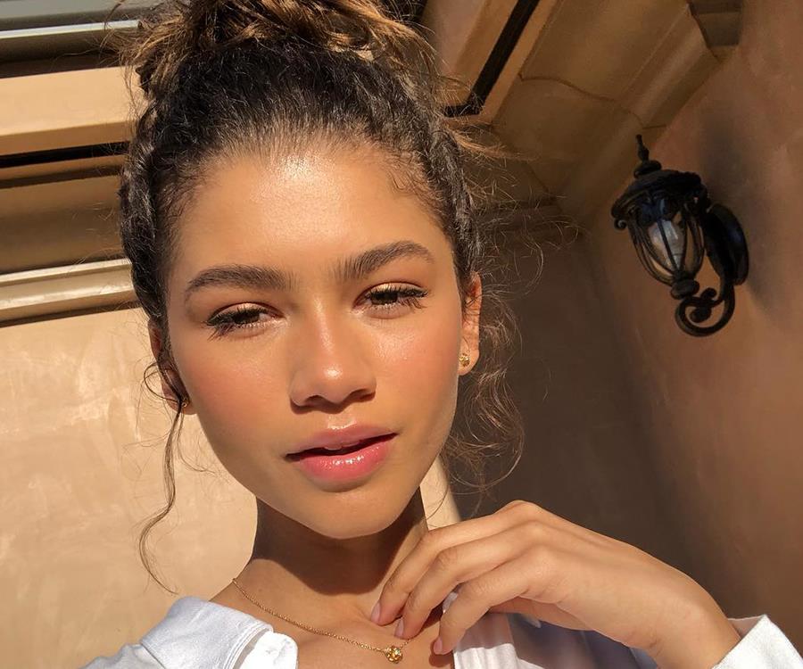 Zendaya with shiny skin.