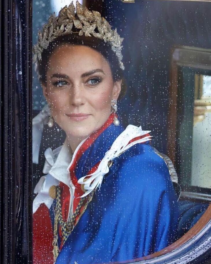Công nương Kate Middleton vẫn giữ được vẻ thanh lịch dù thời tiết ẩm ướt. Ảnh Getty Images.